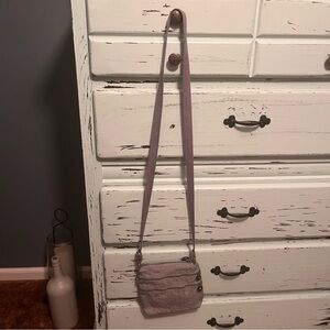 Kipling Small Gray Crossbody Bag with adjustable strap.